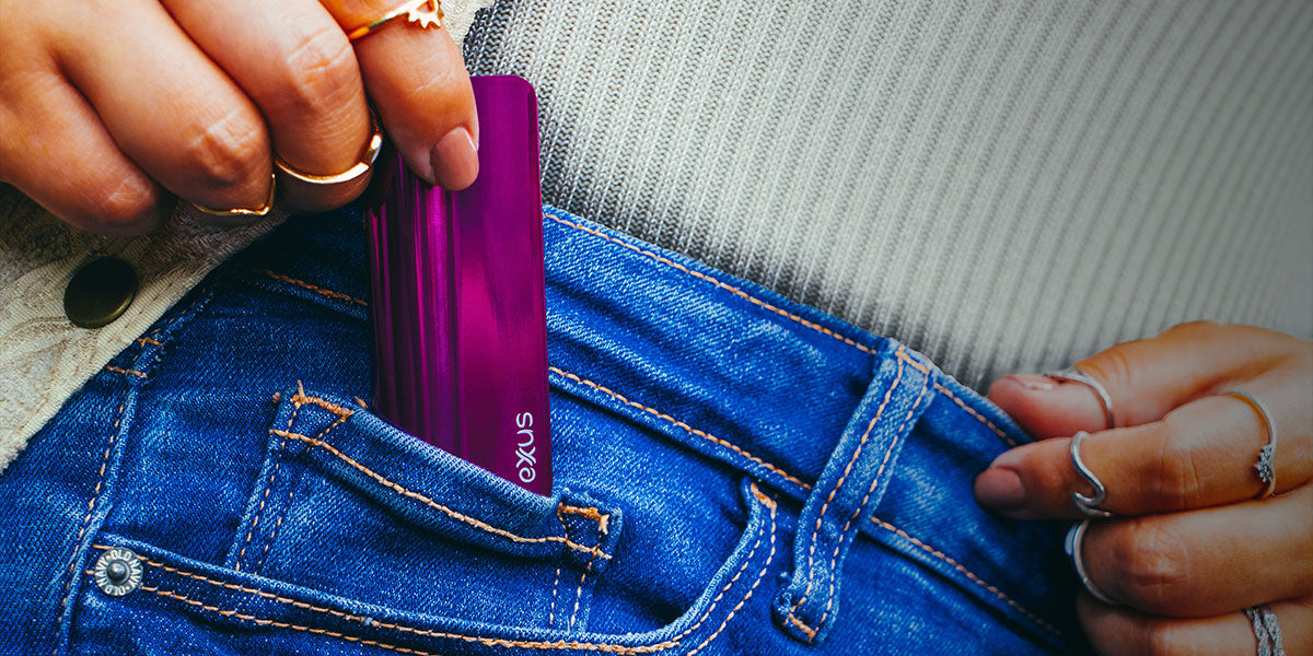 woman putting the Exxus Snap VV Pro inside her pocket